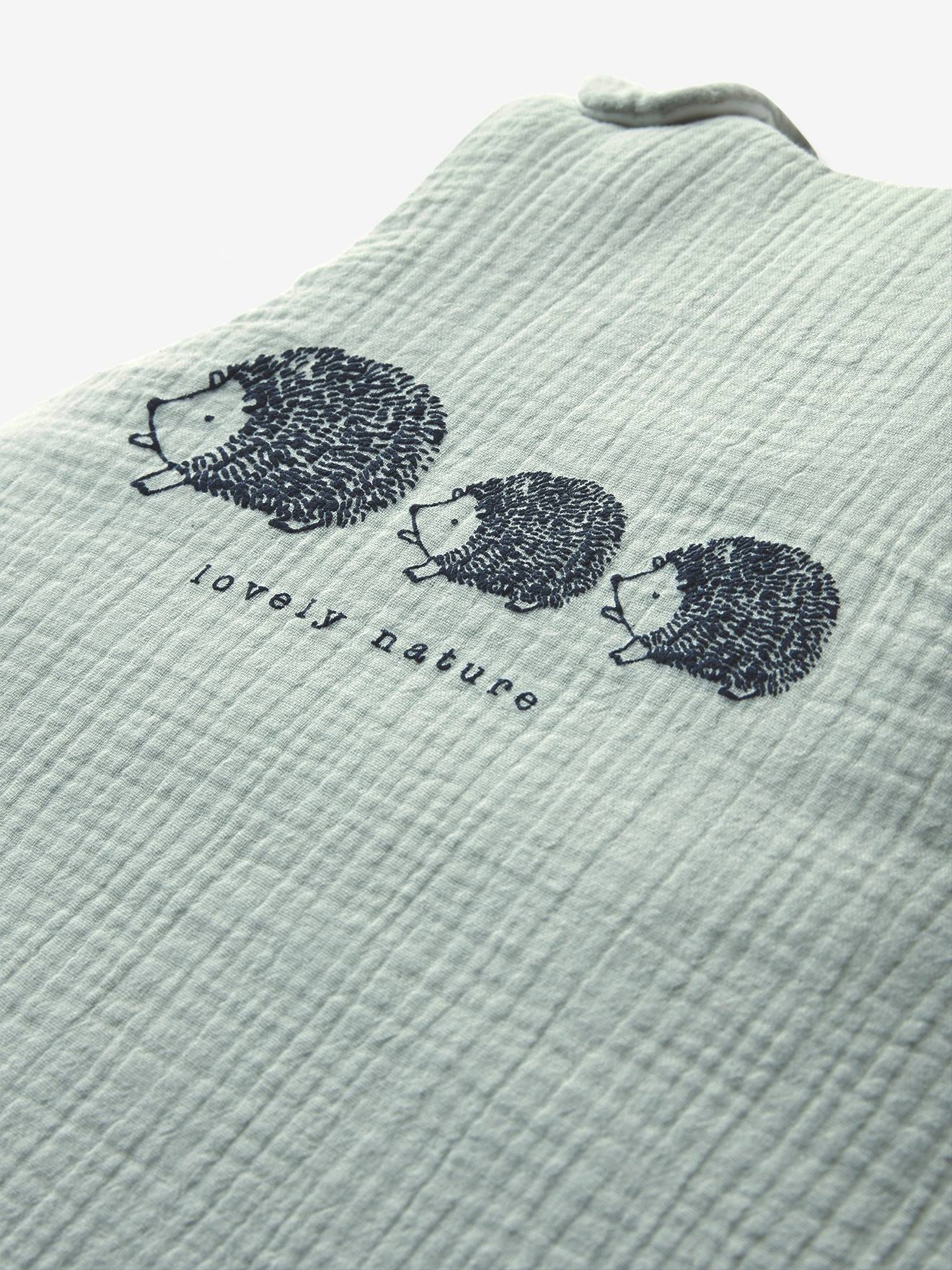 Cardigã sem mangas em chiffon de algodão orgânico* Lovely Nature liso verde médio com motivos