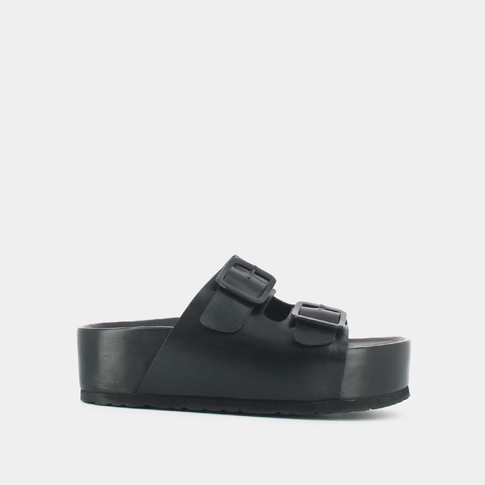 Mules à boucles et plateformes  en cuir noir