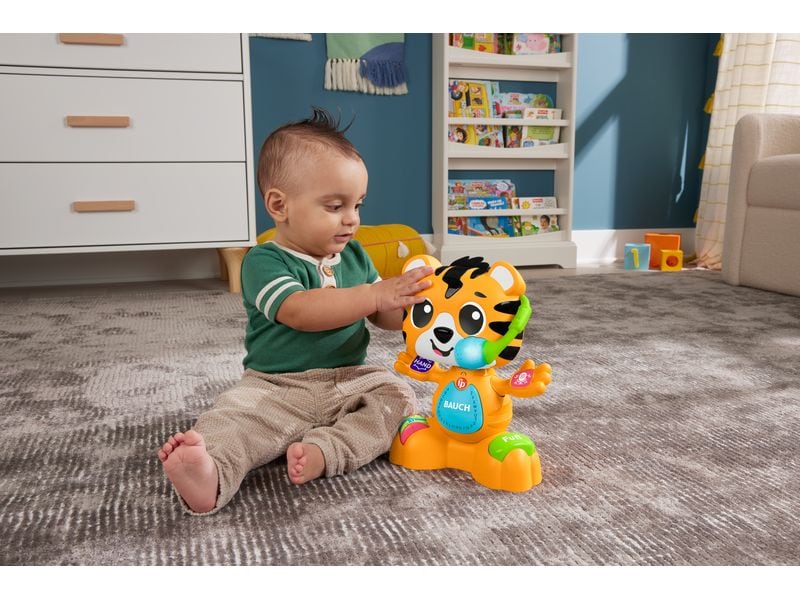 Fisher-Price Beat Bande Lern & Tanz Tiger Justin -DE- Interaktives Tiger-Lernspielzeug mit über 50 lustigen Liedern, Geräuschen und Sätzen,