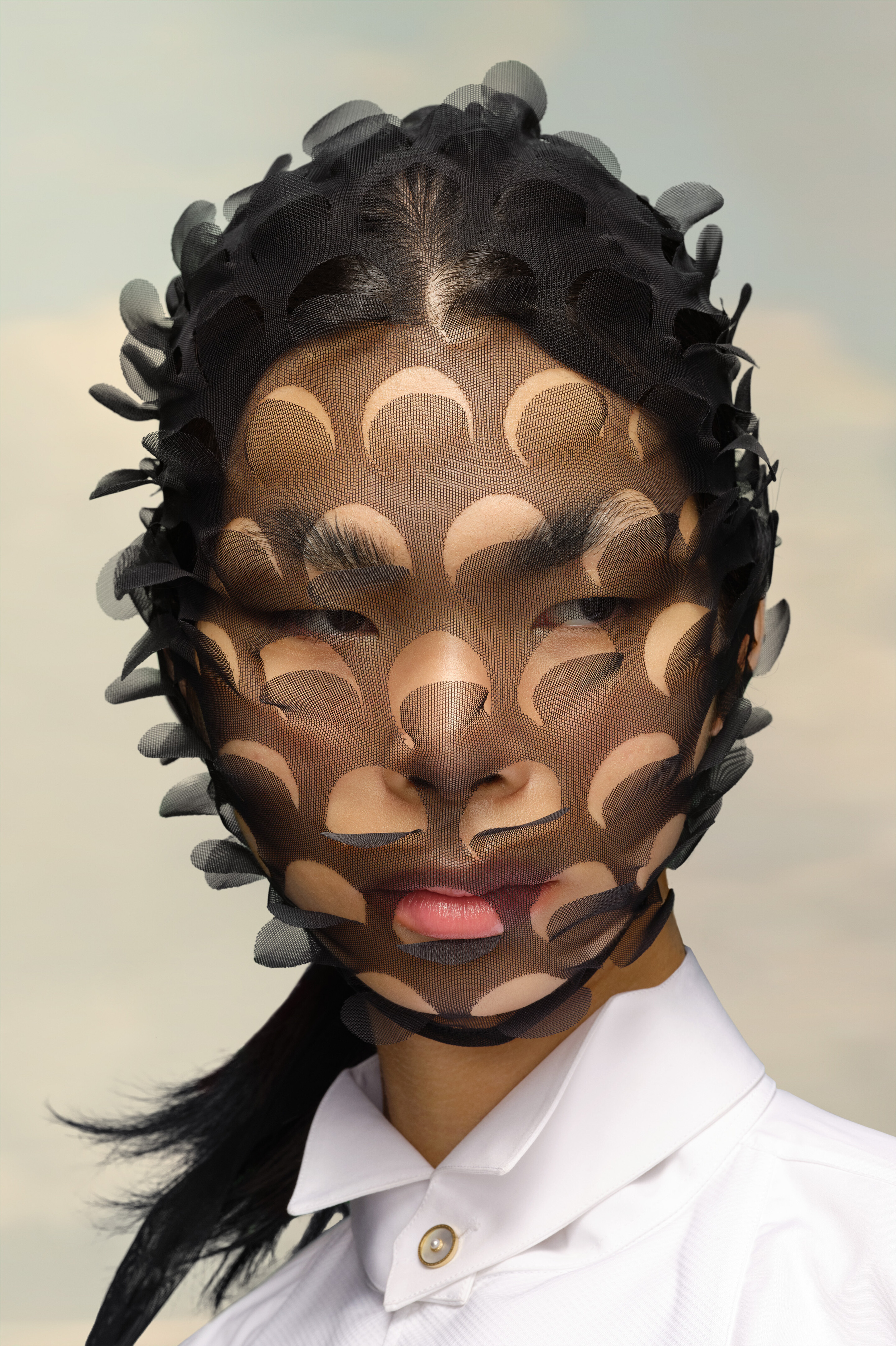 Masque visage en tulle