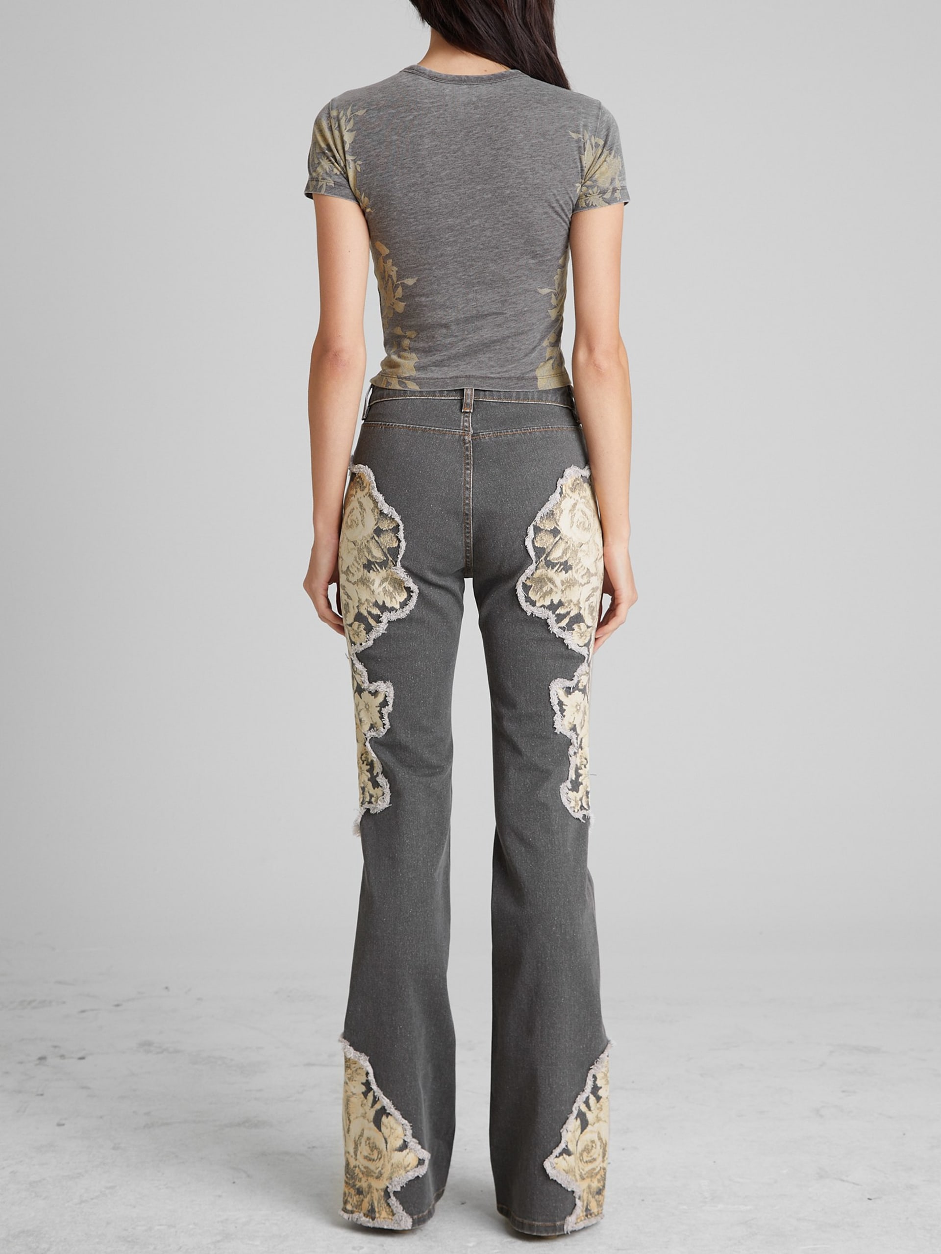 Calça jeans flare estampada