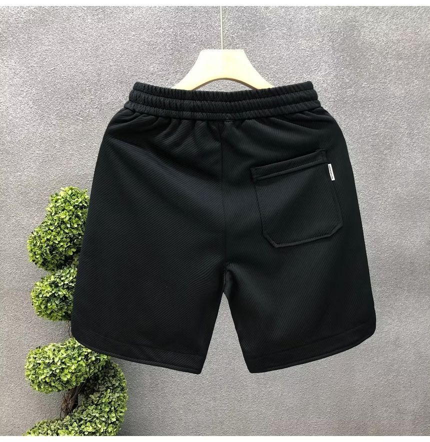 Mokoloko - Sweatshorts met trekkoord en letterprint