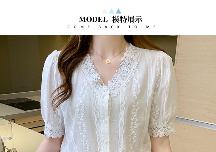 Tel tot 10 - Blouse met korte mouwen, V-hals en effen kant