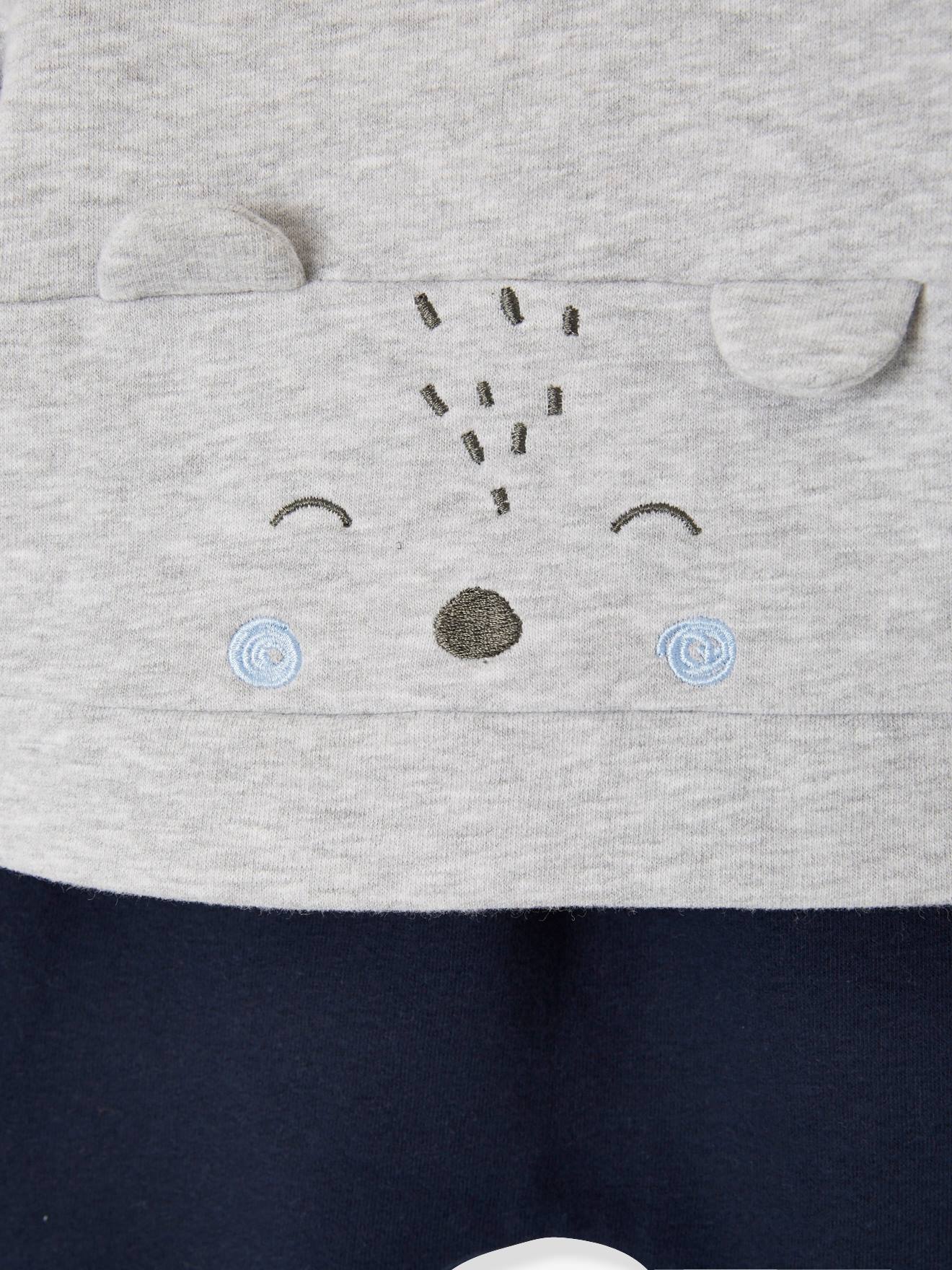 Conjunto personalizável para recém-nascido composto por moletom e calça lisa azul-escura com estampas.
