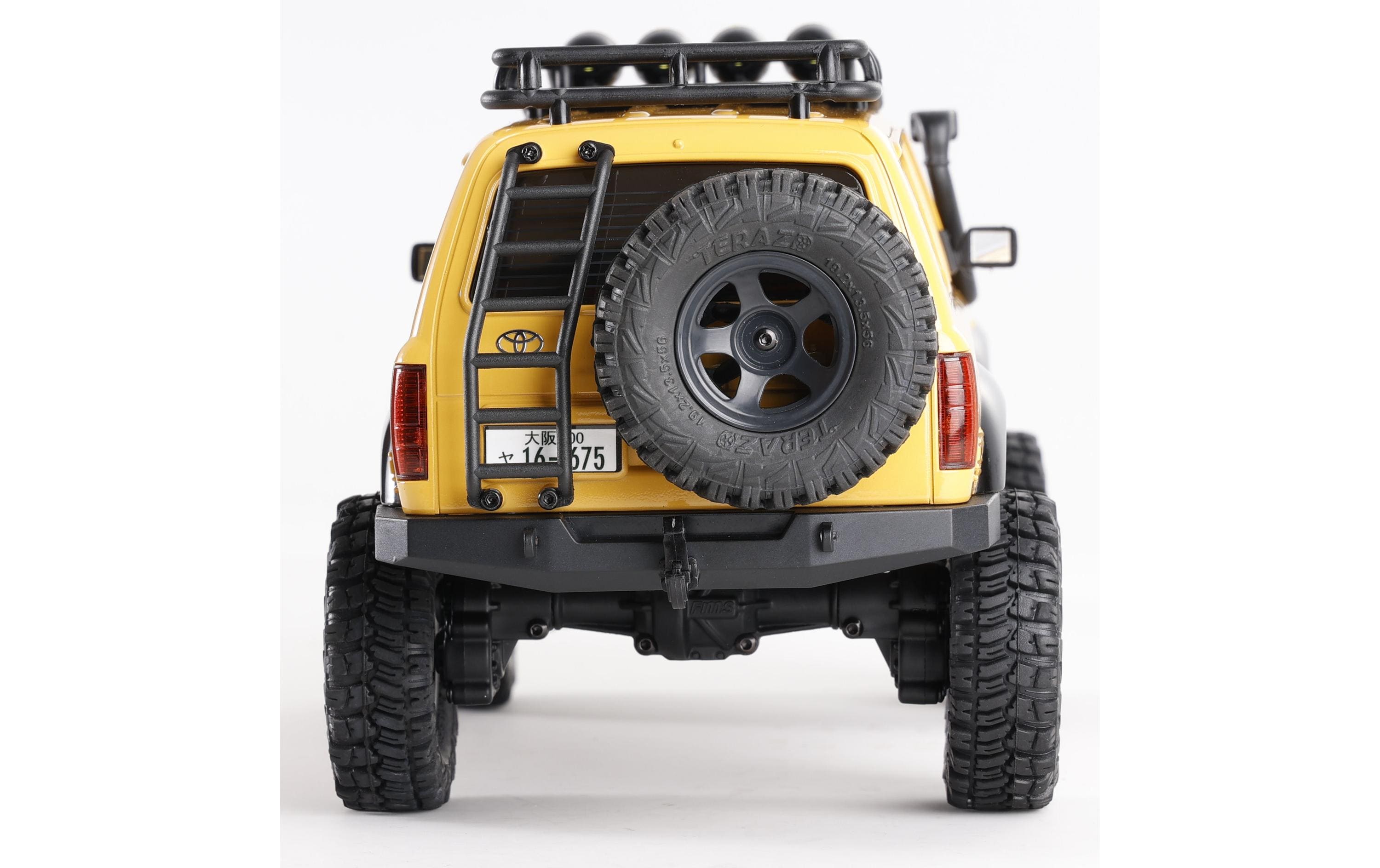 Scale Crawler FCX18 Toyota LC80 Gelb, RTR, 1:18<br>Mini Rock Crawler mit detaillierter Toyota Landcruiser Karosserie und 2-Gang Getriebe