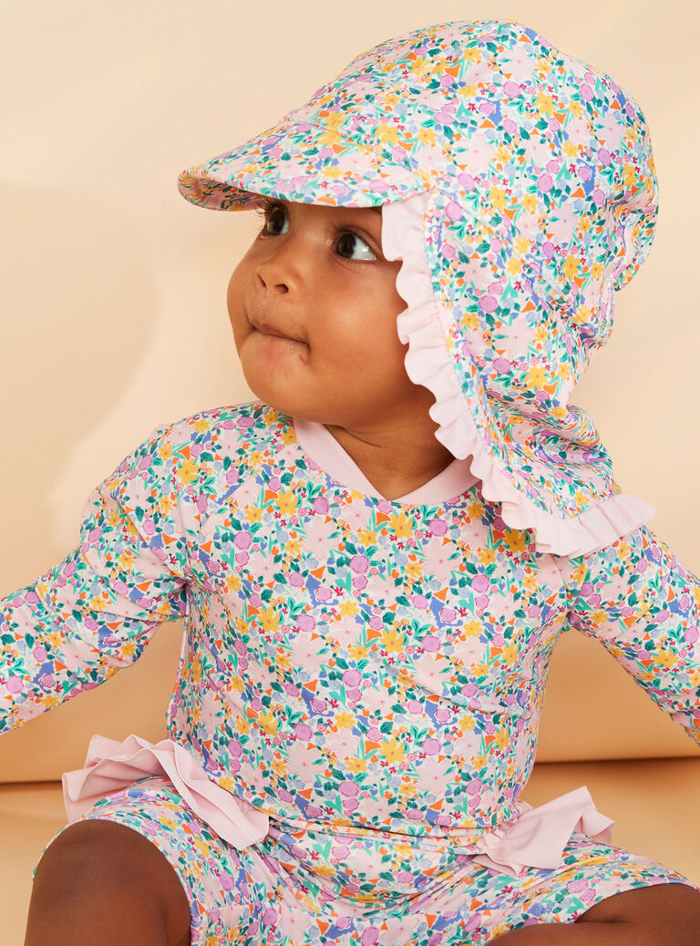 Chapeau de bain rose et vert à imprimé fleuri
