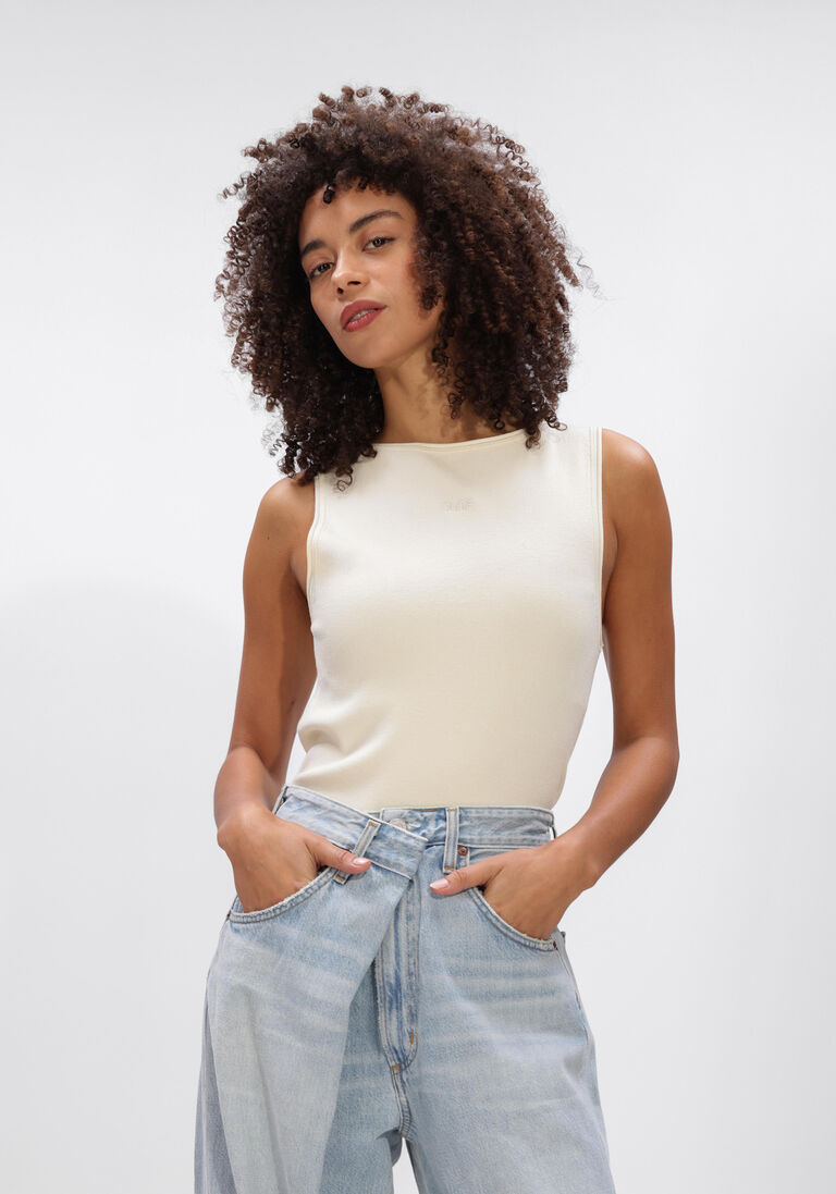 ecru olaf hussein top retro logo sleeveless knit