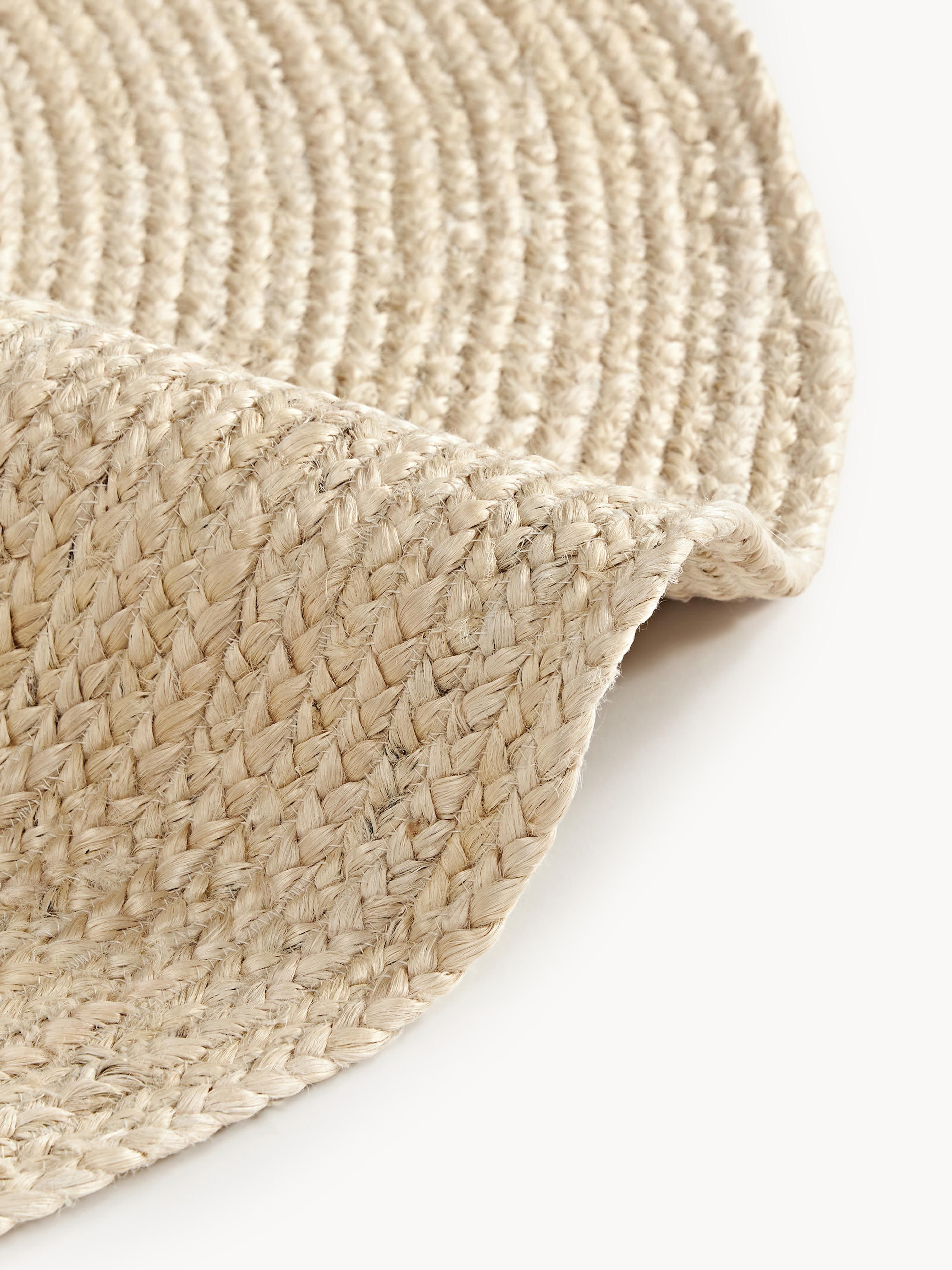 Rond juten vloerkleed Sharmila, handgemaakt