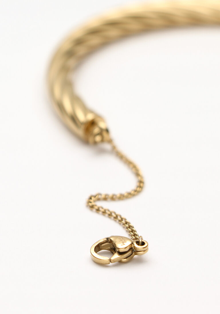 NOTRE-V gouden notre-v armband bangle gedraaid