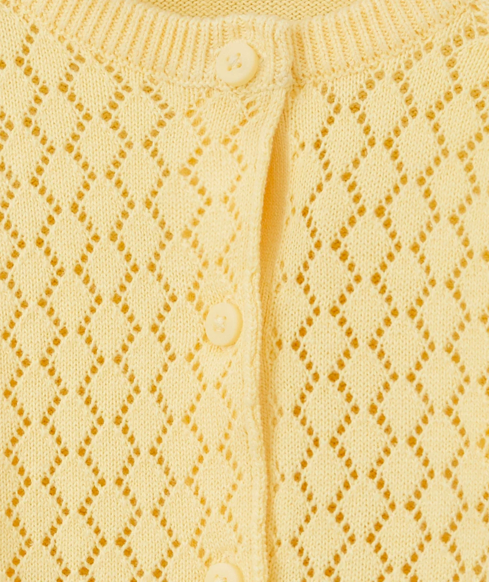 CARDIGAN BÉBÉ FILLE JAUNE EN COTON AJOURÉ