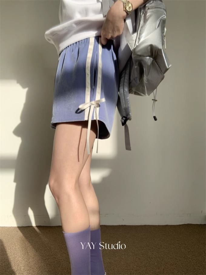 Alfie - Mid Rise gestreepte shorts met strik