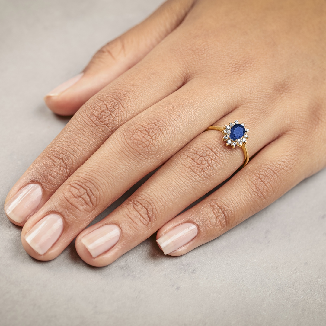 Damenring 750/18 K Gelbgold mit Diamanten 0.22 ct H/si & Saphir 1.00 ct
