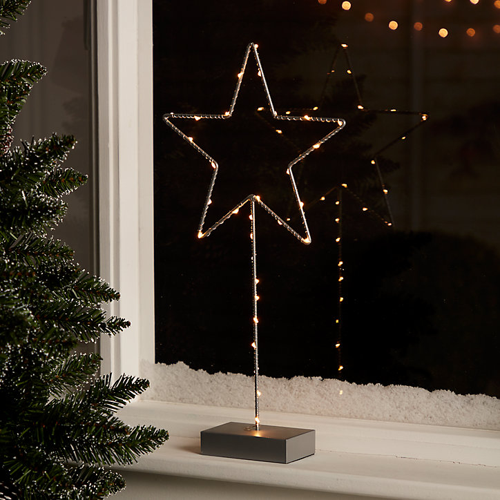 Etoile sur pied argentée LED 50 cm blanc chaud
