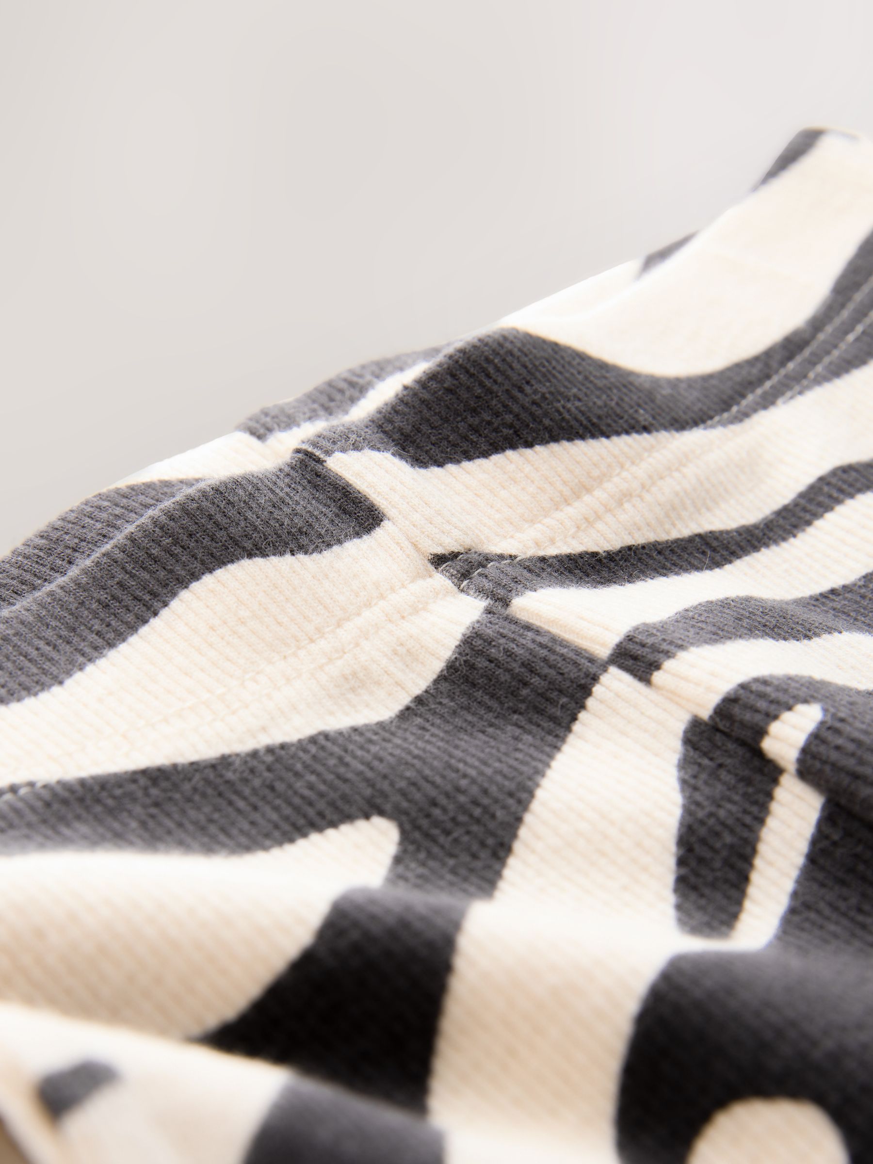 Zwart/wit - Geribbelde flare legging (3 mnd-7 jr)