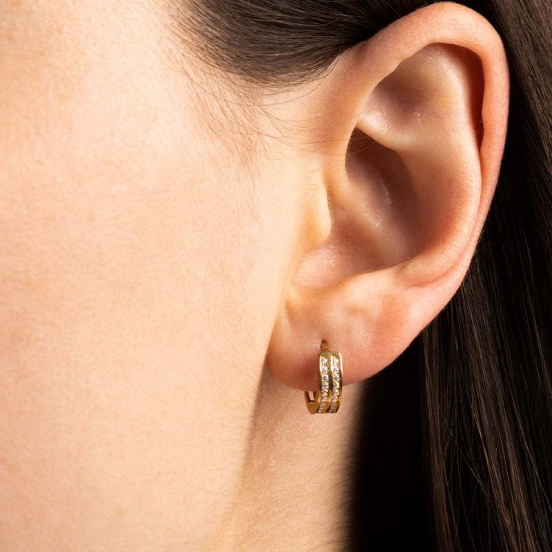 Boucles d'oreilles or jaune et oxydes de zirconium 
