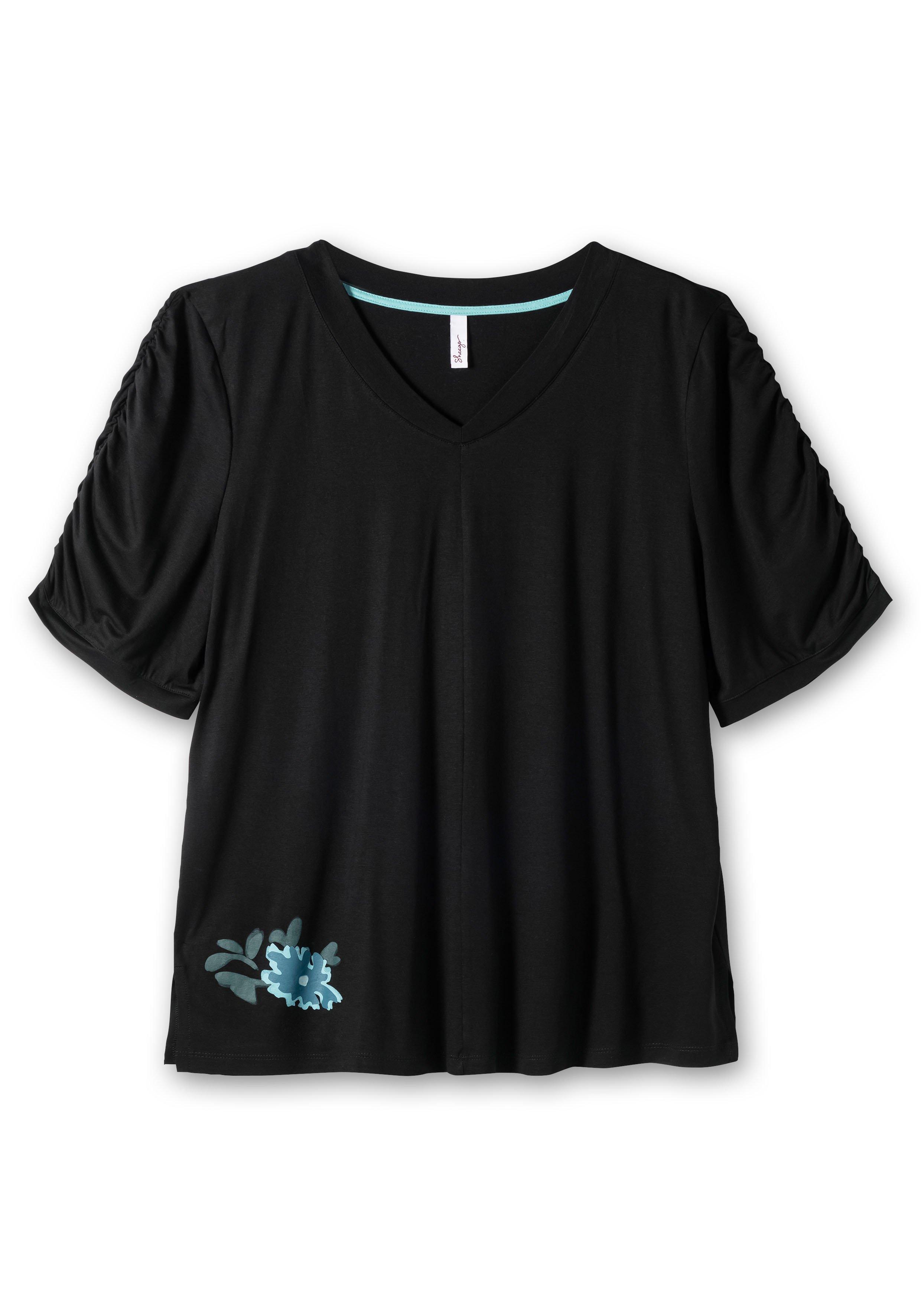 Shirt mit Blütenprint am Saum
