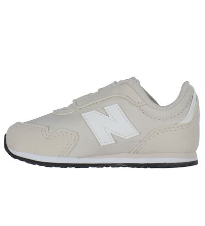 New Balance Schuhe - 323 - Timberwolf/Sea Salt