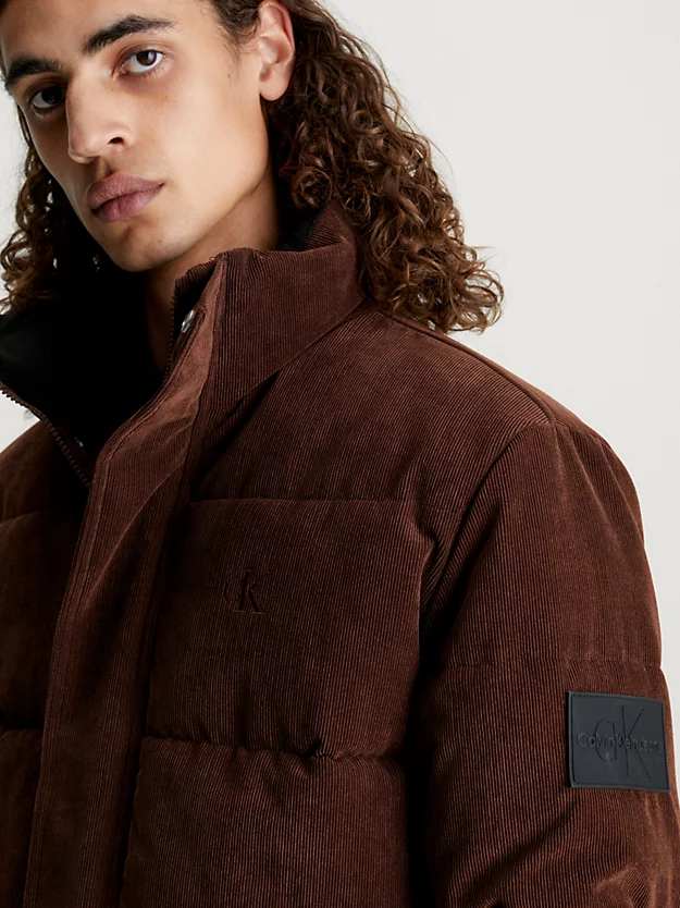 Jaqueta oversized de veludo cotelê com enchimento de plumas