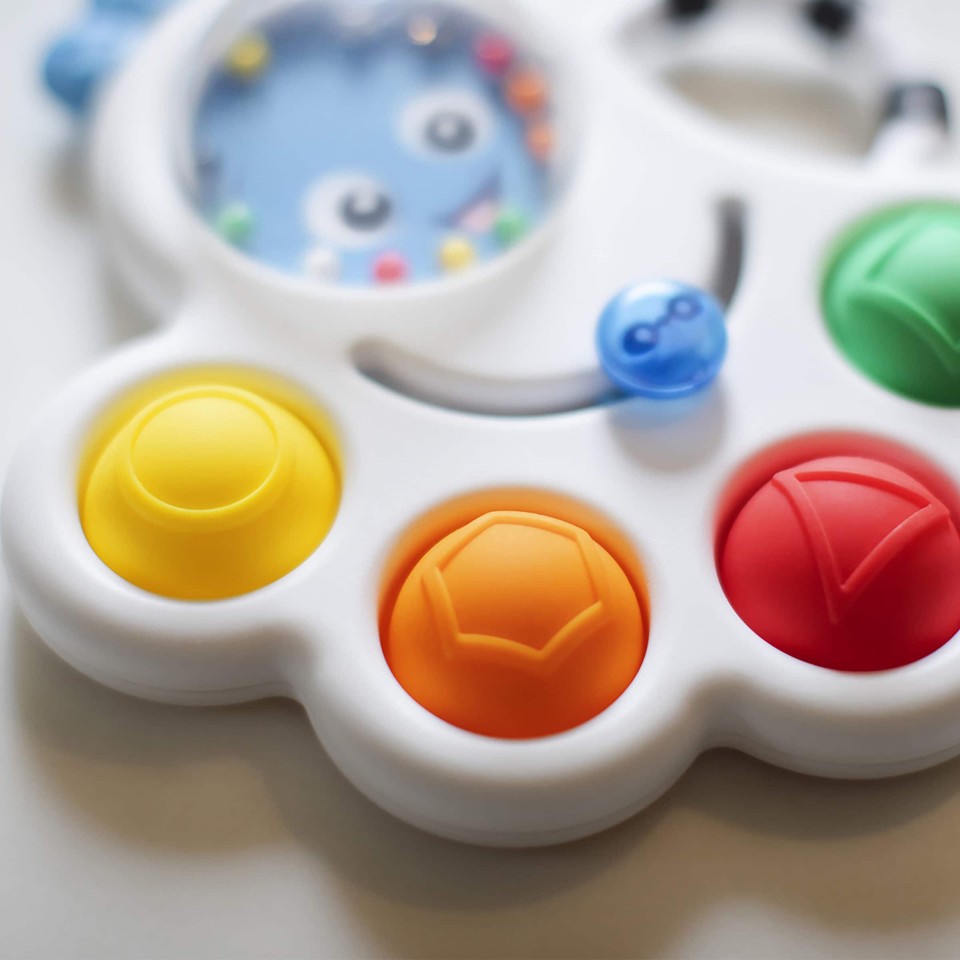 Baby Einstein - Opus’s Shape Pops™ sensorisk rangle og bidering