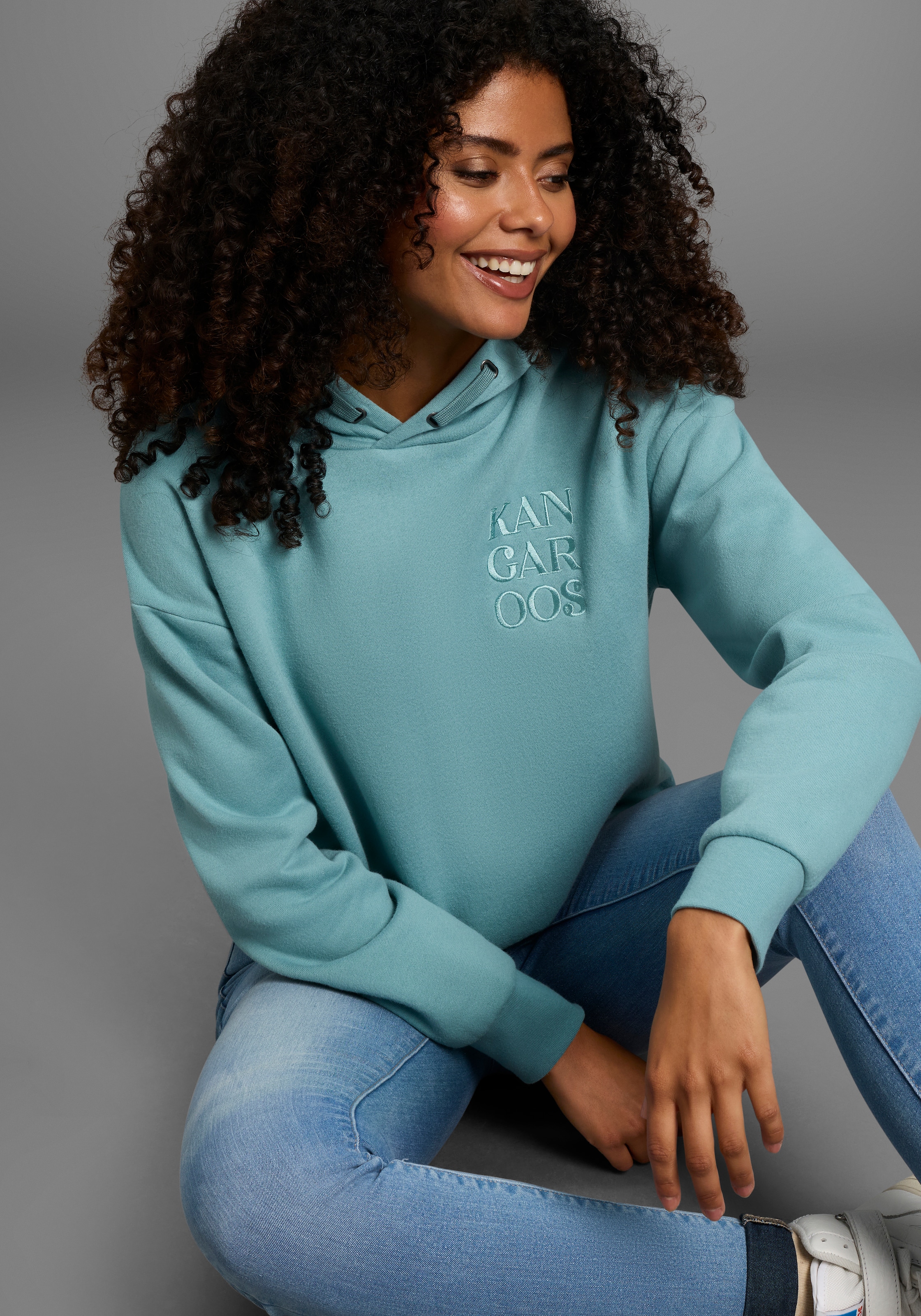 KangaROOS Kapuzensweatshirt , mit Druckknöpfen am Saum