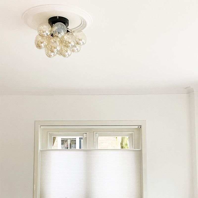 Design plafondlamp zwart met amber glas 3-lichts - Uvas