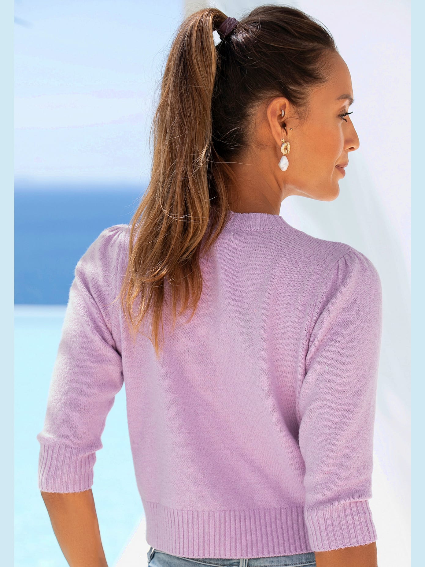 Veste en tricot courte avec encolure ronde