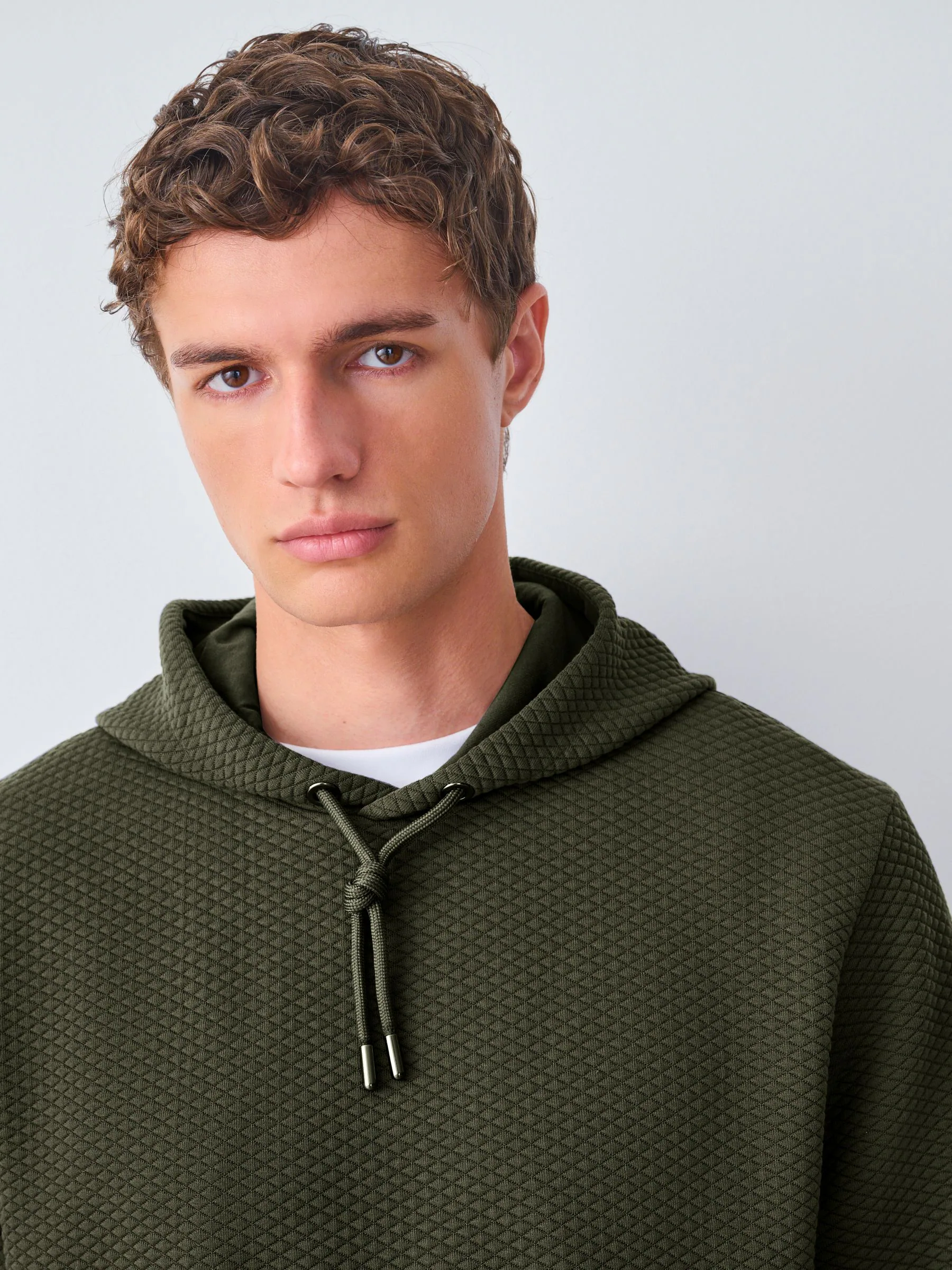 Kakigroen - Pullover-hoody met textuur