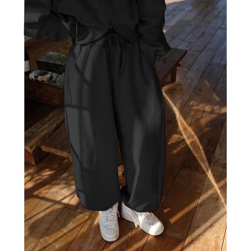 Alizio - Opstaande kraag, effen cropped jack met rits / Harem-joggingbroek met hoge taille