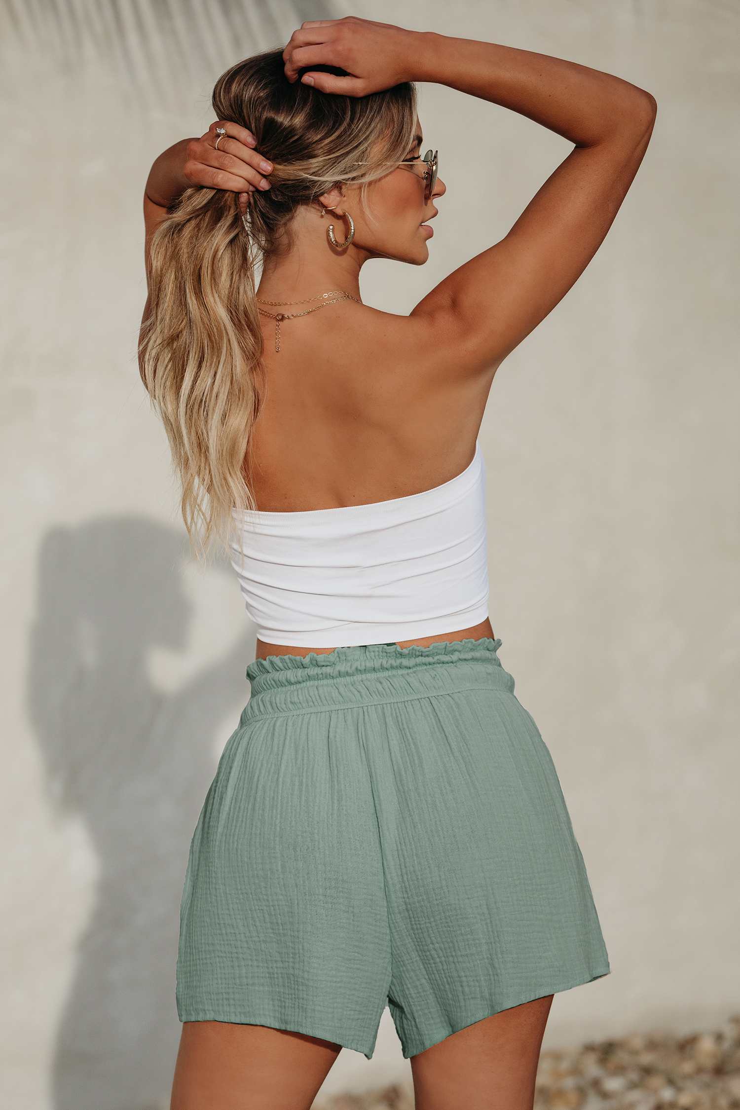 Short avec jambe évasée à smocks