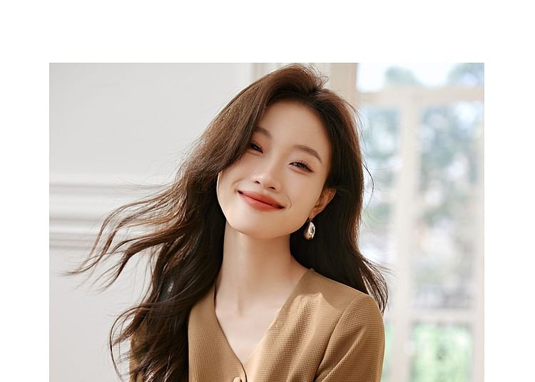 Jeonseon - Blouse met lange mouwen, V-hals en effen peplum