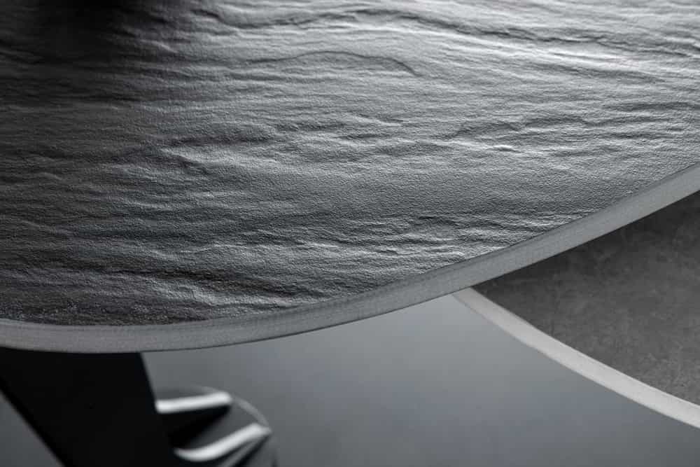 Design Couchtisch MOVEMENT schwarz grau rund drehbar Keramik Metallgestell
