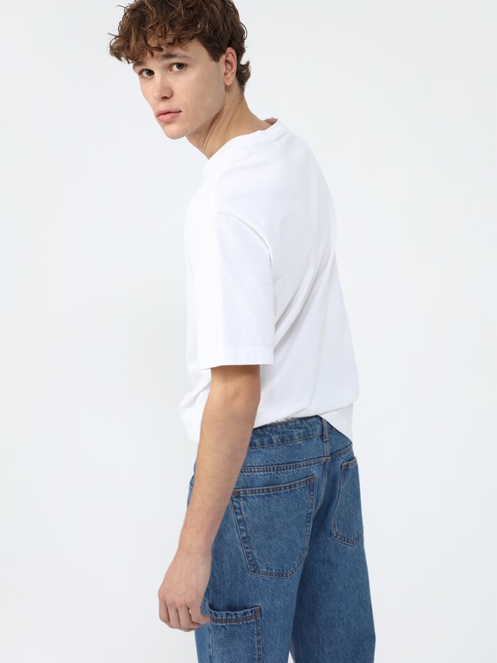 Calça jeans repaginada e com caimento relaxado - Índigo