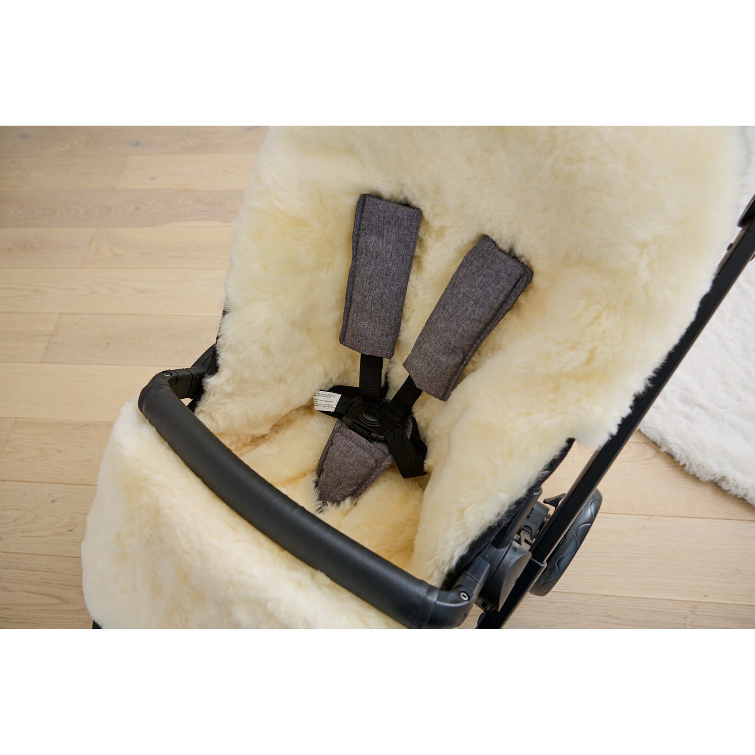 babycab Lammfell-Fußsack Skaidi für Kinderwagen, Buggy schwarz