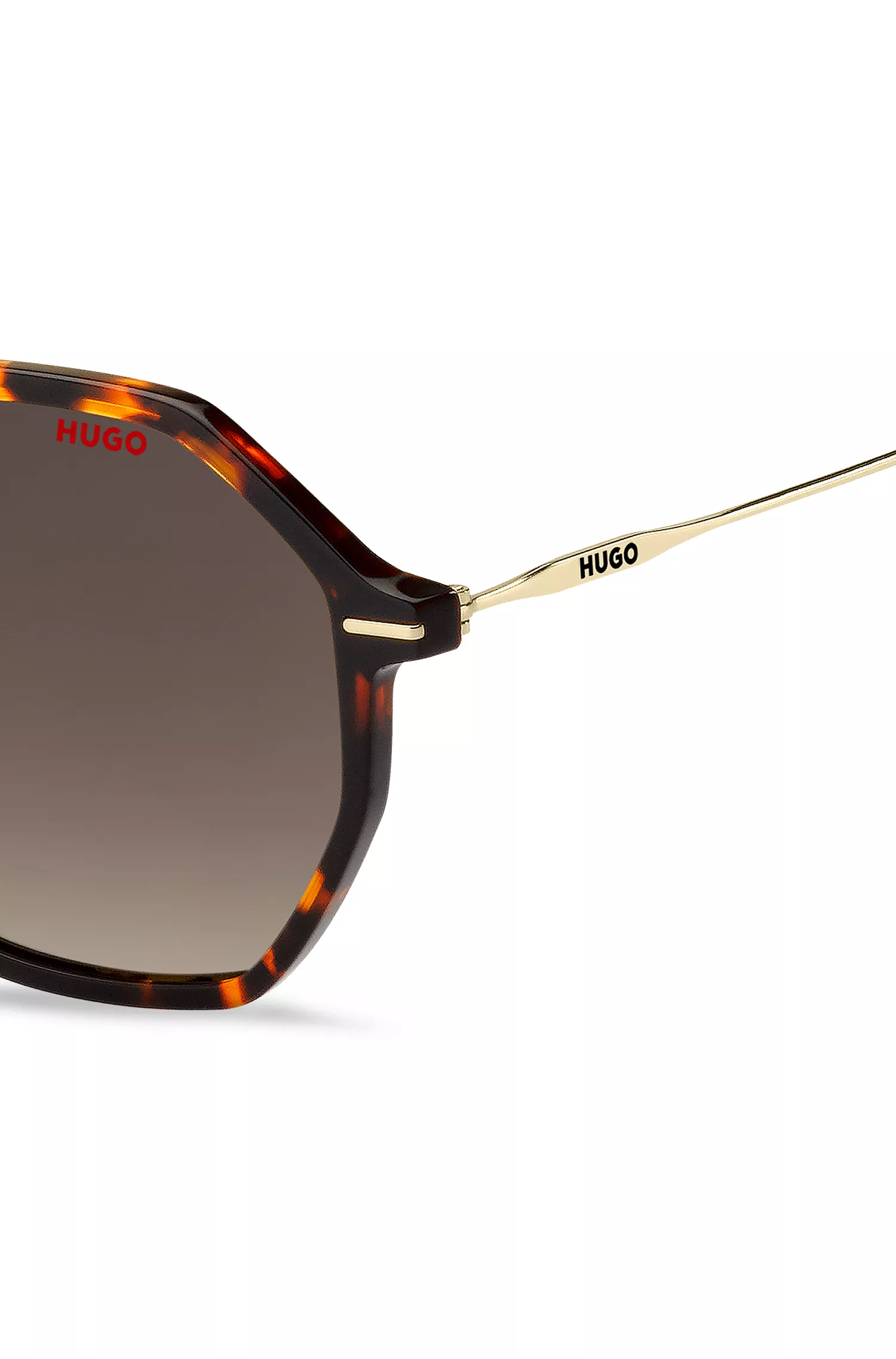 Óculos de sol HUGO em acetato vermelho Havana com hastes douradas.