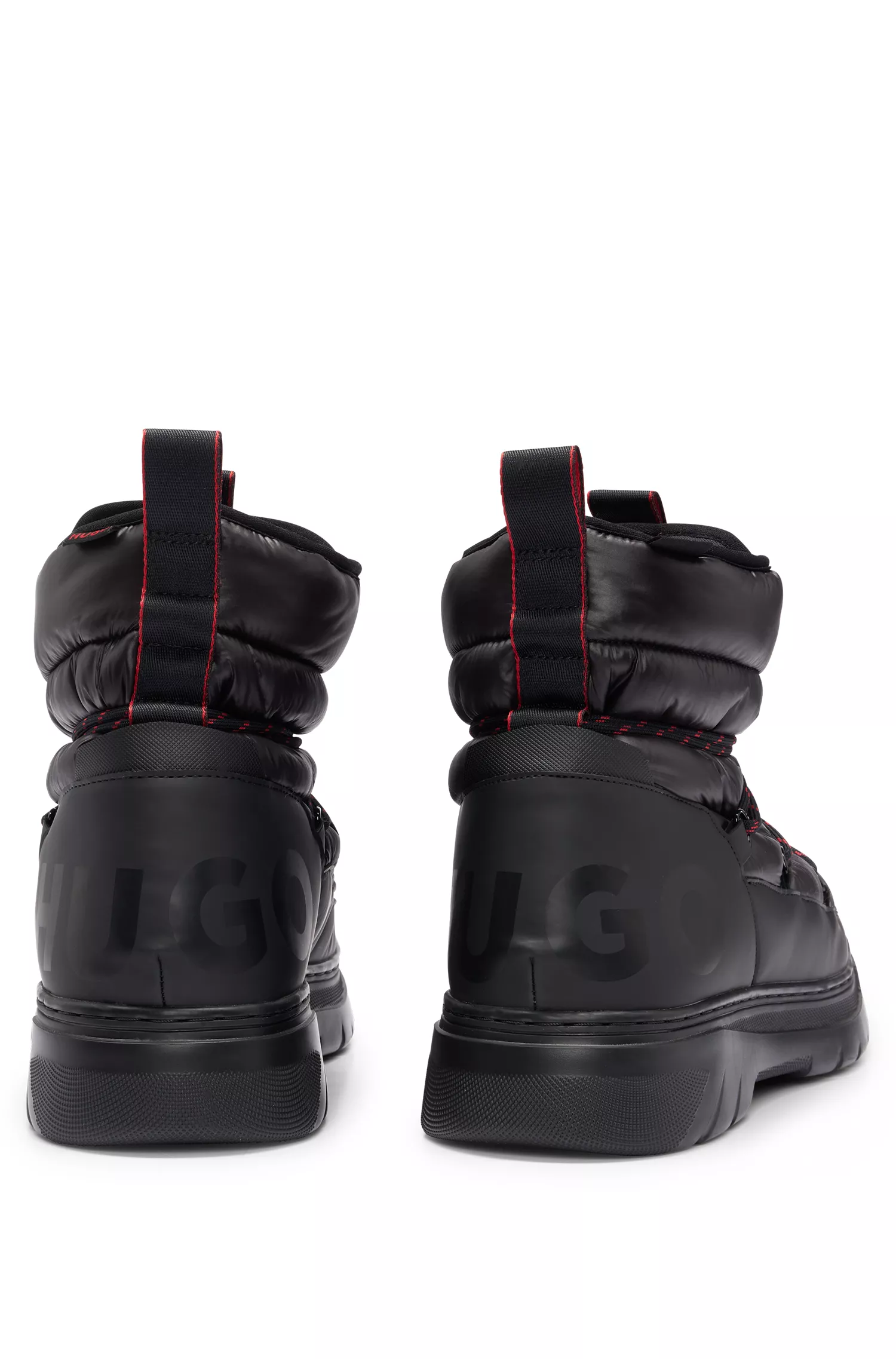 Botas de inverno HUGO vermelhas acolchoadas com detalhes da marca e cadarços estampados.