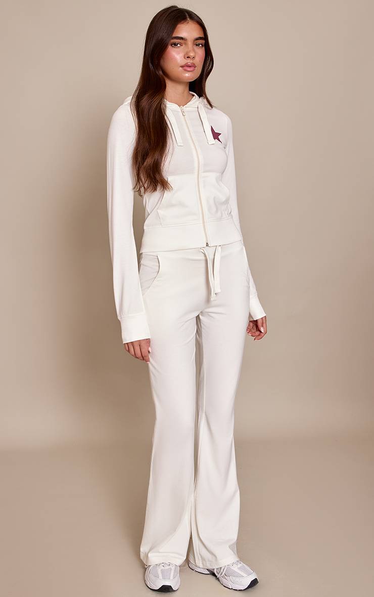 Crème Pantalon Évasé Ajusté À Imprimé Étoiles