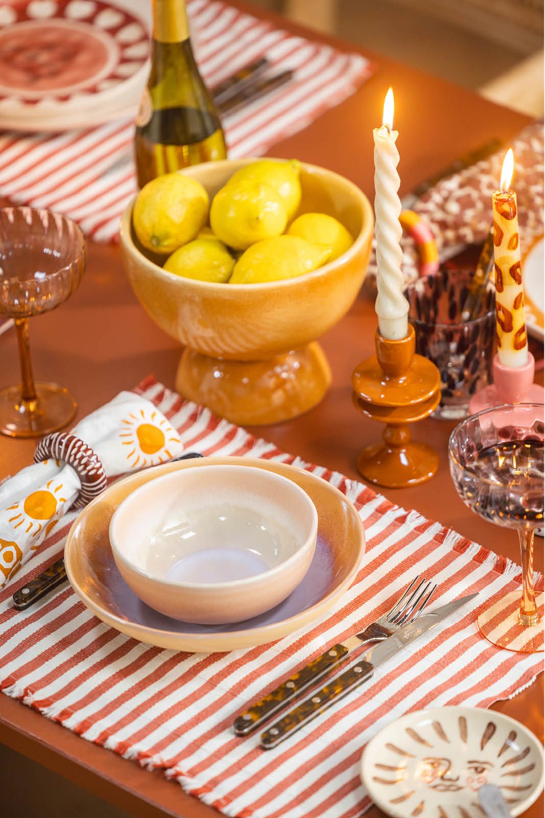 Set van 2 oranje gestreepte placemats