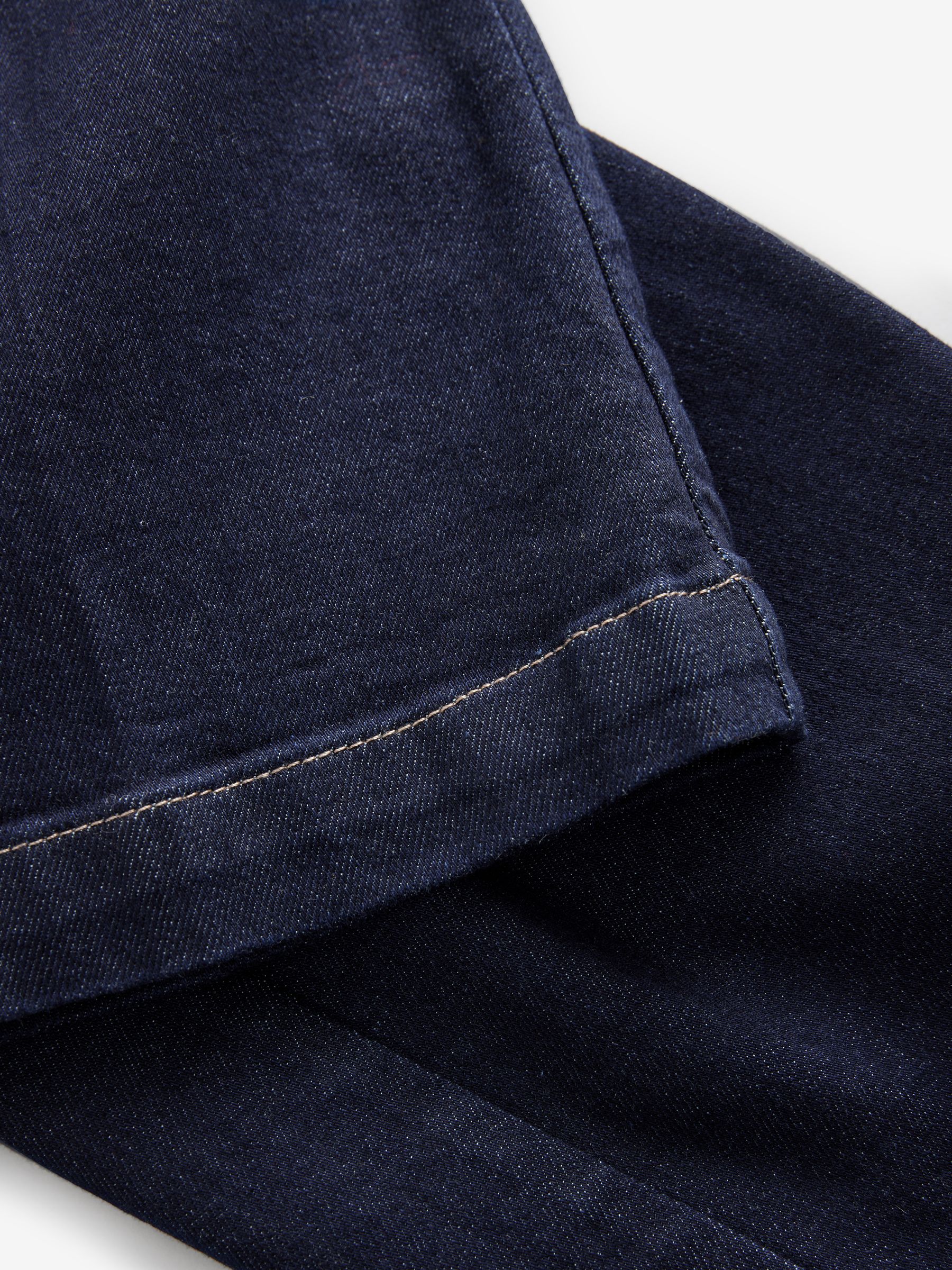 Blauw met wassing - Jeans met zandloperpasvorm en wijde pijpen