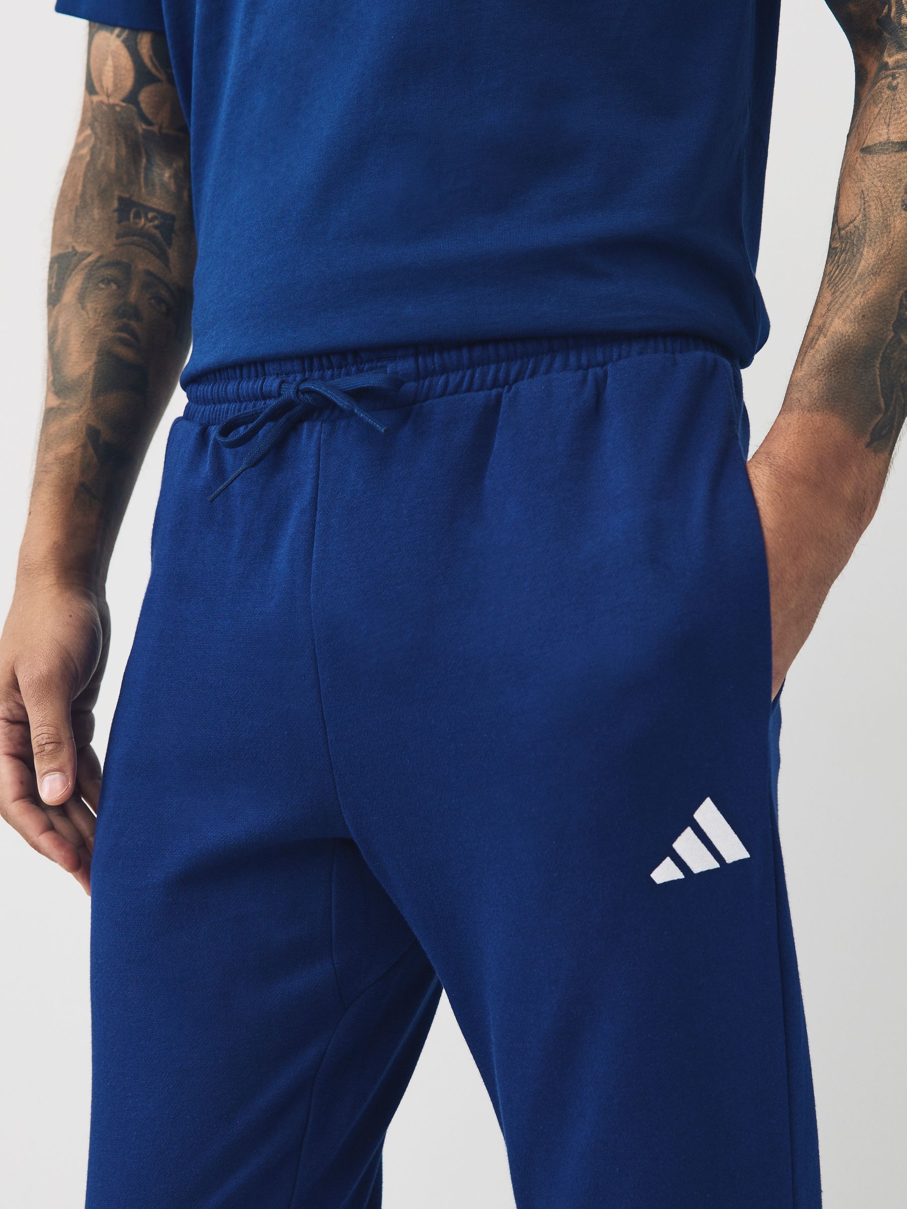 Blauw - adidas Essentials Feelcozy fleece joggingbroek