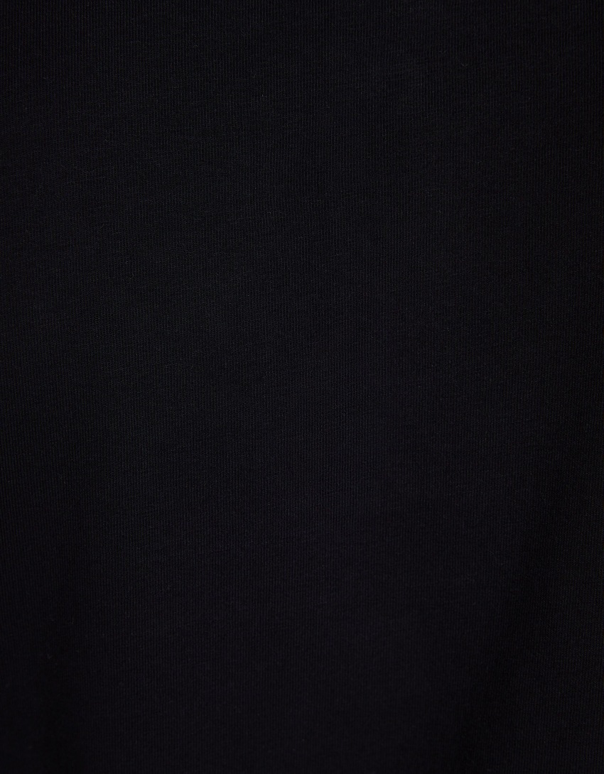Camisa polo listrada de manga curta