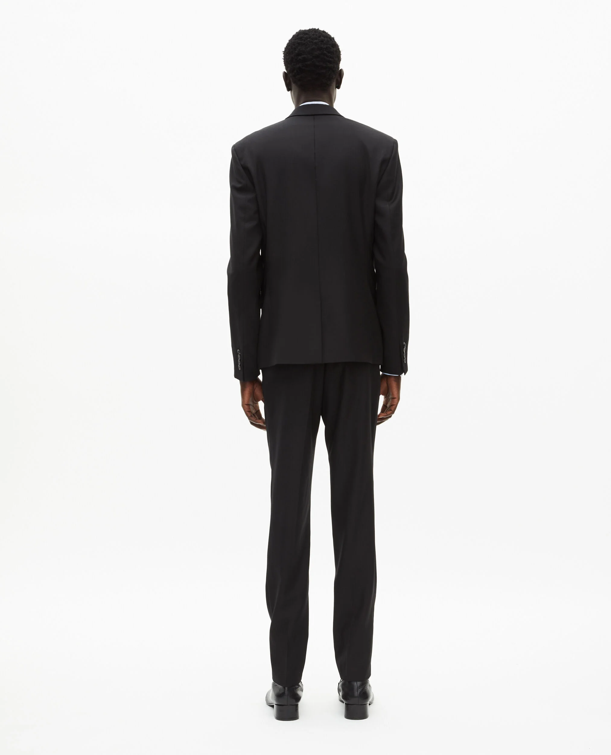 Veste de costume en laine noire coupe tailleur ajustée
