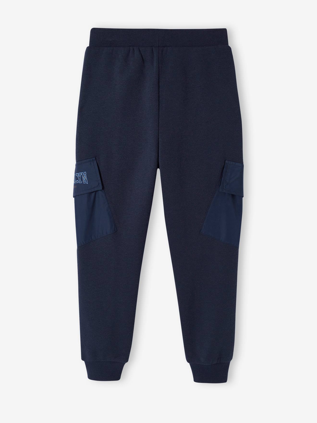 Calça de fato de treino infantil azul-escuro com bolsos de aba.