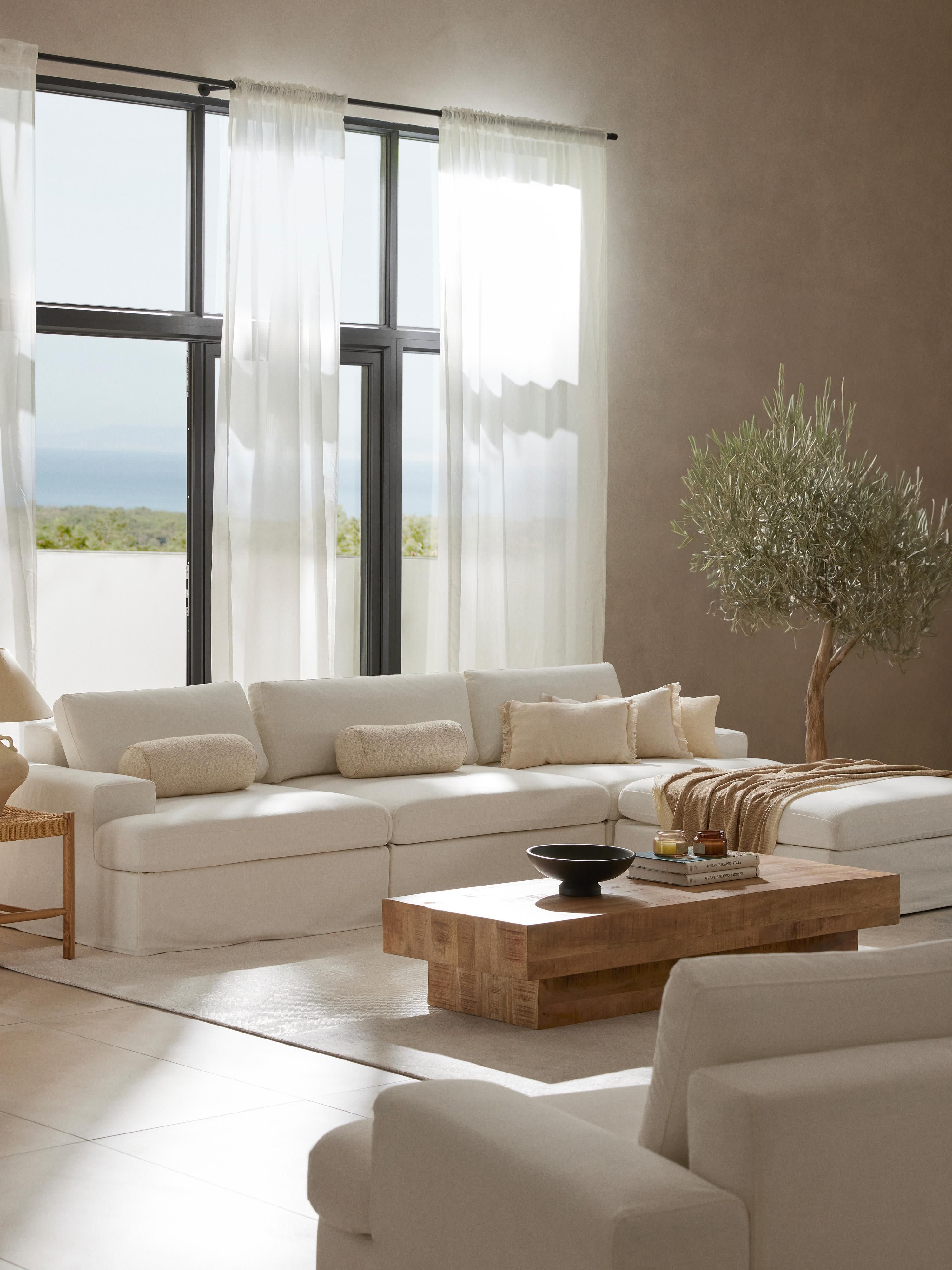 Modulaire bank Russell (4-zits) met poef (links/rechts)