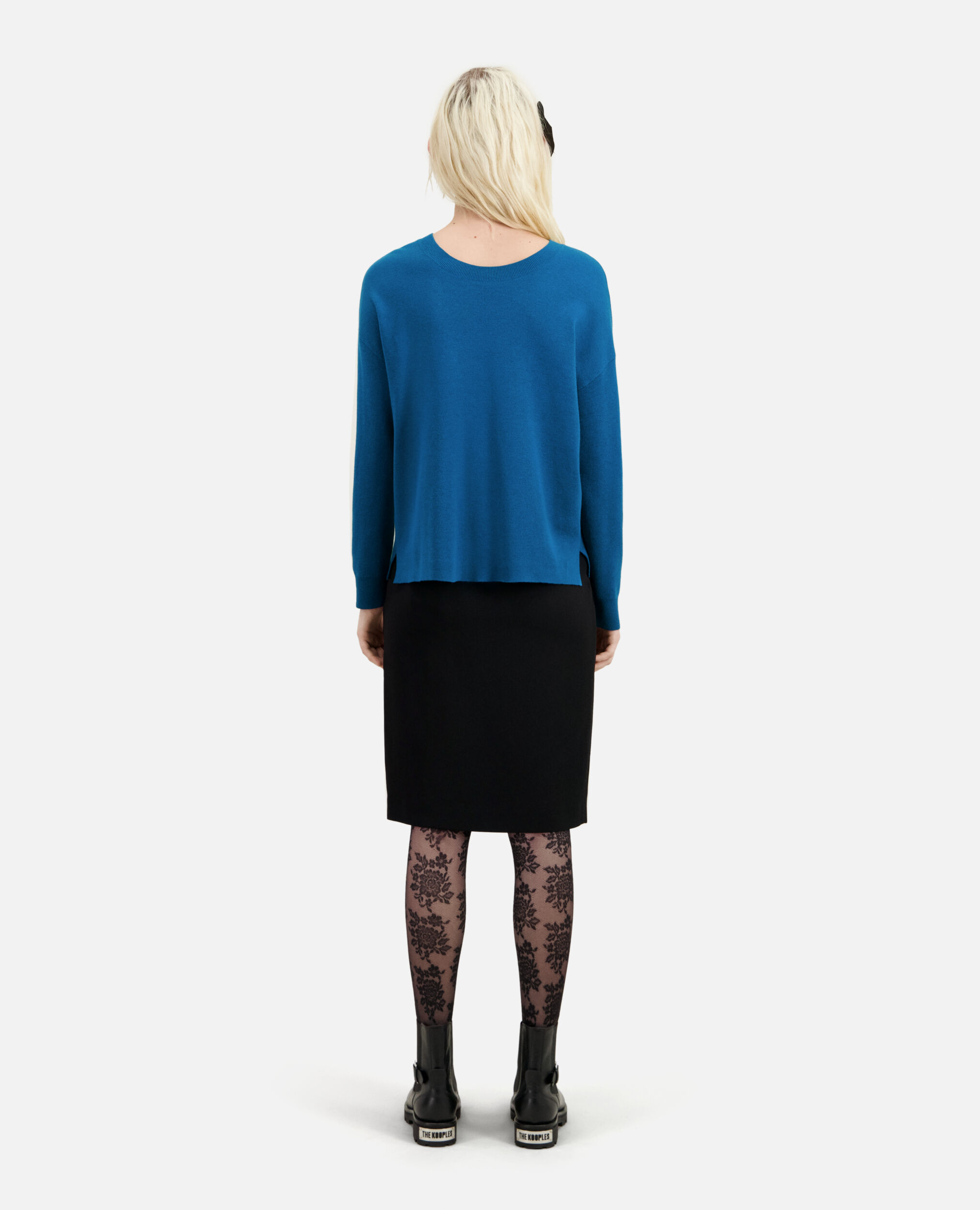 Blue sweater with buttoning on the back