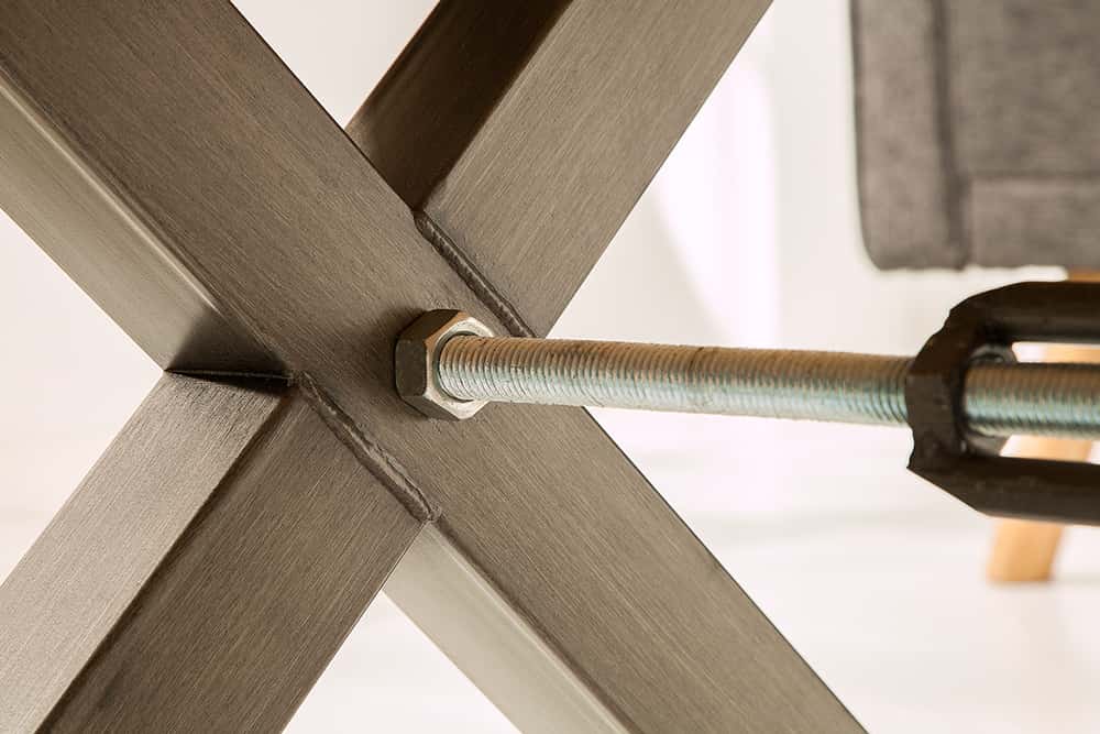 Massivholz Couchtisch THOR 110cm Wildeiche geölt X-Gestell Metall anthrazit Industrial Design