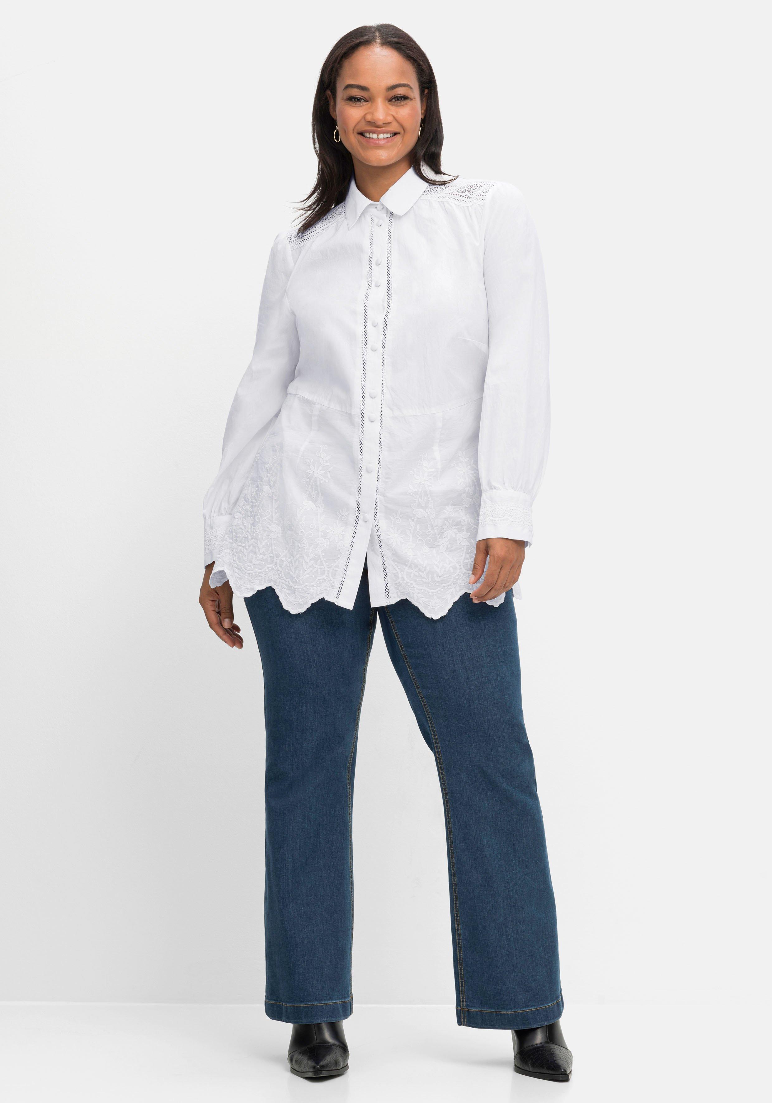 Bluse mit floralen Stickereien und Wellensaumkante