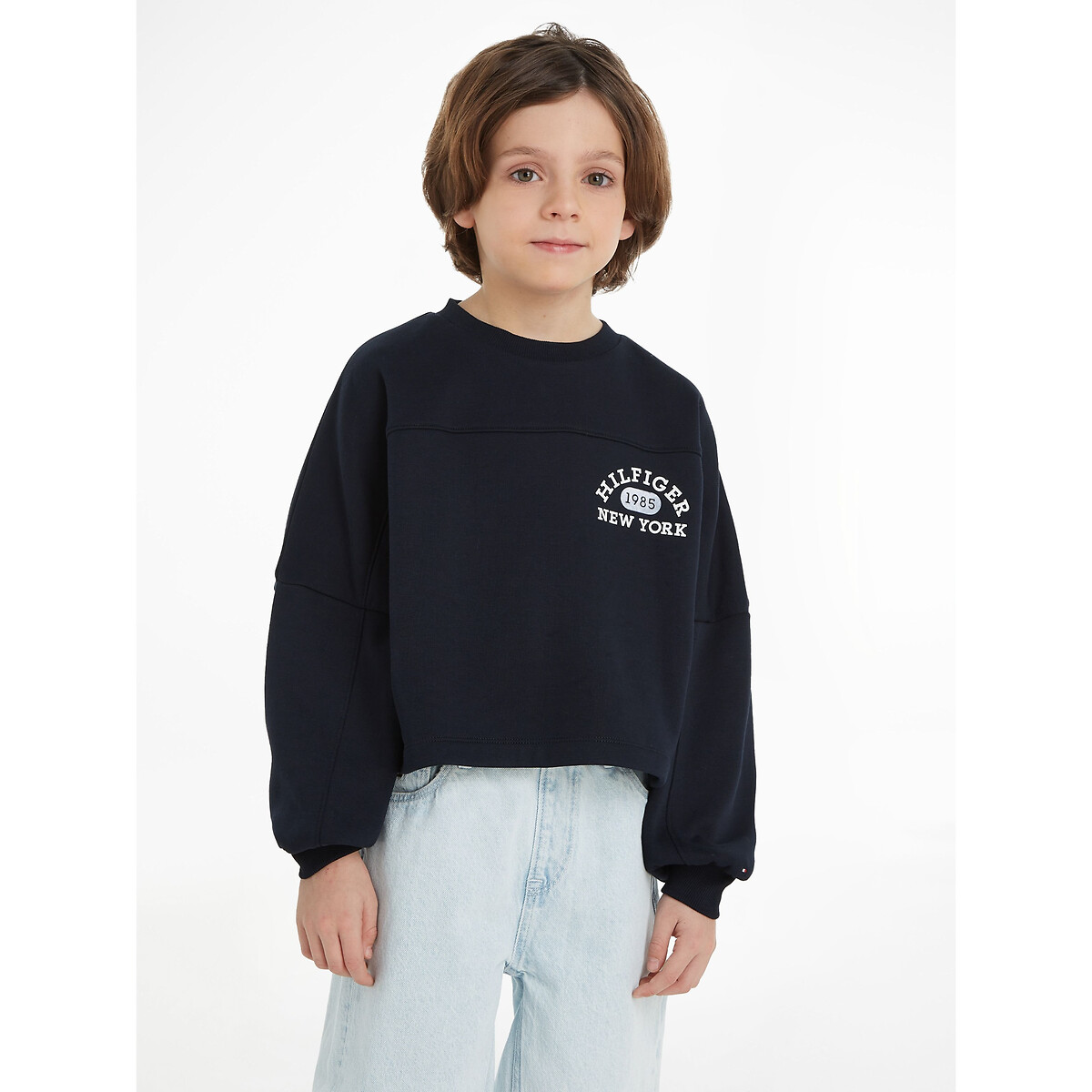 TOMMY HILFIGER<br>Suéter universitário de gola redonda em fleece