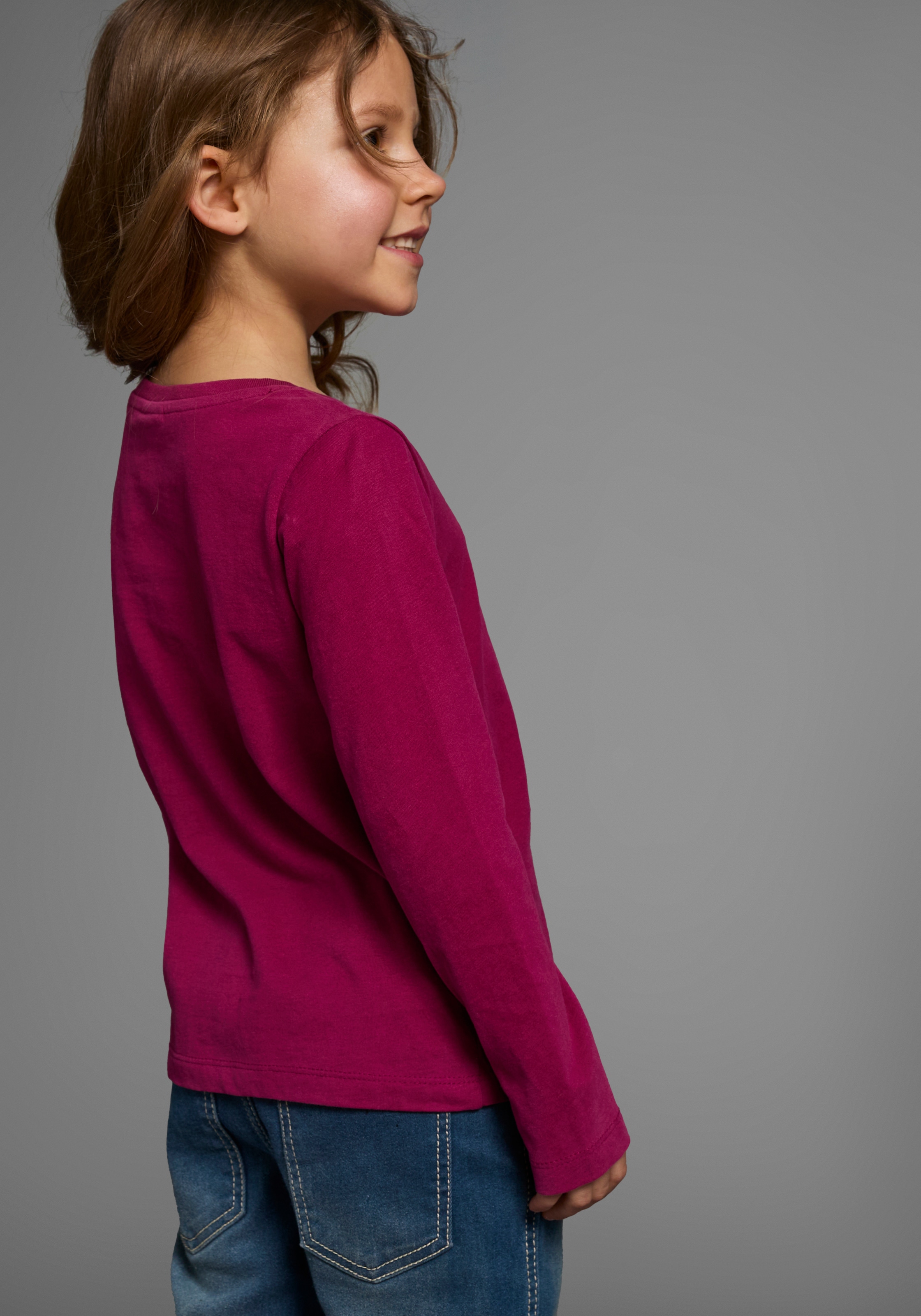 KIDSWORLD Langarmshirt »Mit Spruch: Happy Glitzer Tag« Langarm,  hüftlange Passform,  Rundhalsausschnitt