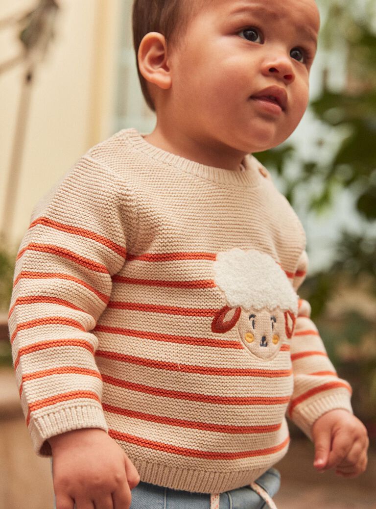 Pull beige clair à imprimé à rayures