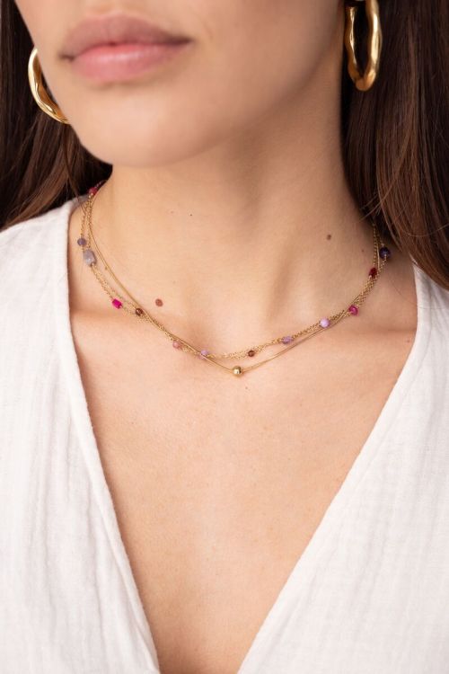 Driedubbele ketting met roze en paarse kraaltjes